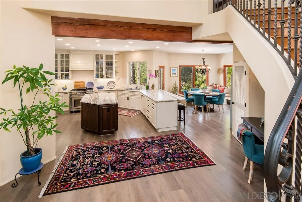 16722 Via Lago Azul Rancho Santa Fe, CA 92067 - Photo 2 of 20 a living room with furniture rug and wooden floor