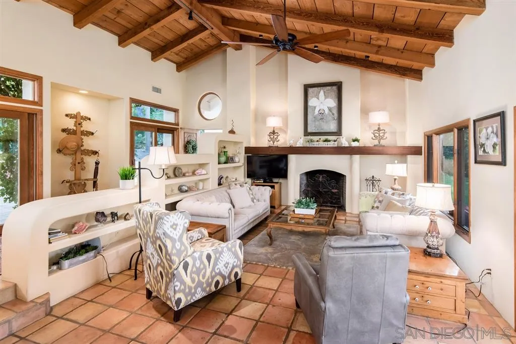 16722 Via Lago Azul Rancho Santa Fe, CA 92067 - Photo 4 of 20 a living room with furniture and a fireplace