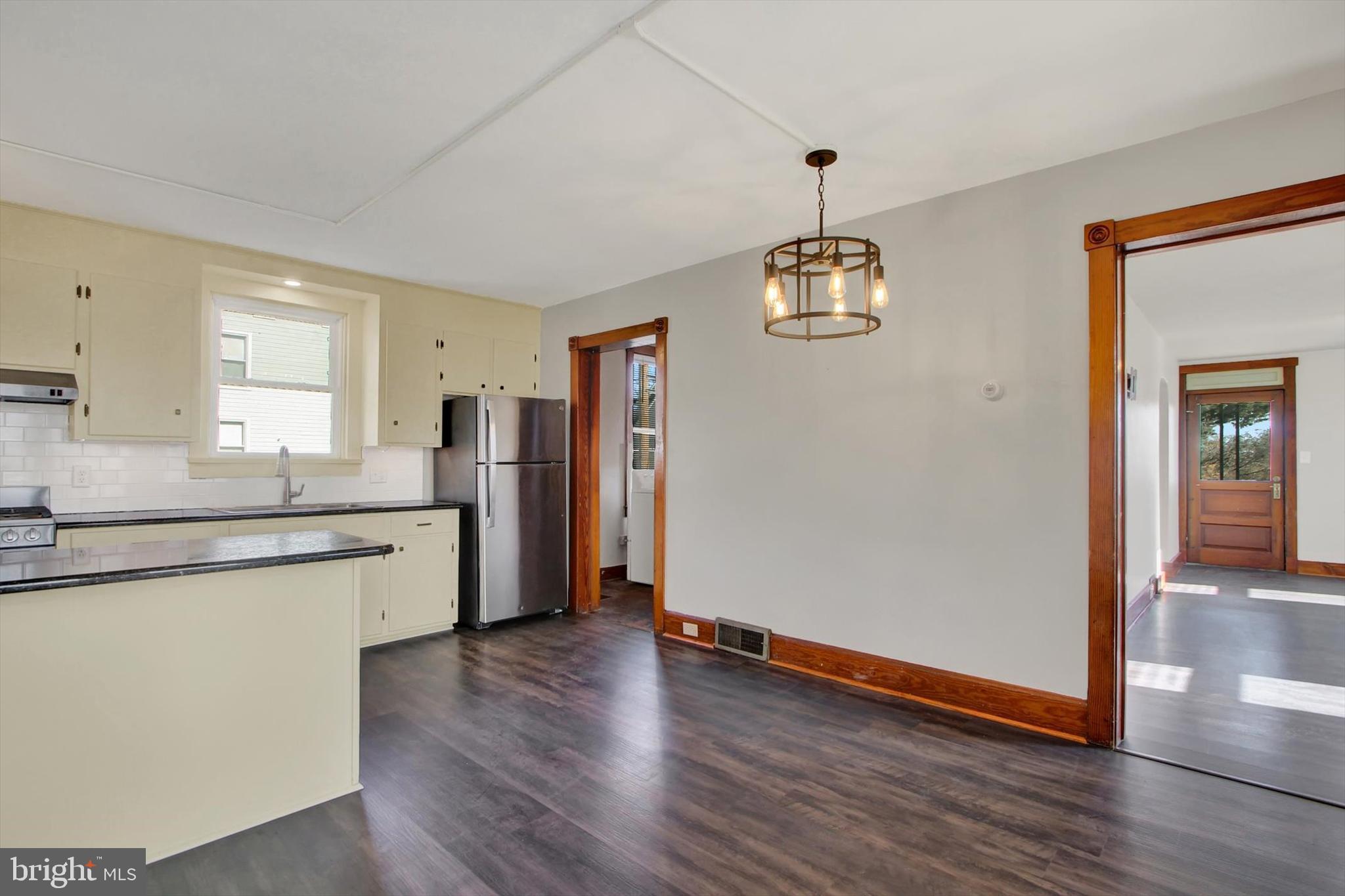 367 High Street Orrtanna, PA 17353 - Photo 13 of 26 a kitchen with stainless steel appliances granite countertop a refrigerator and a stove top oven