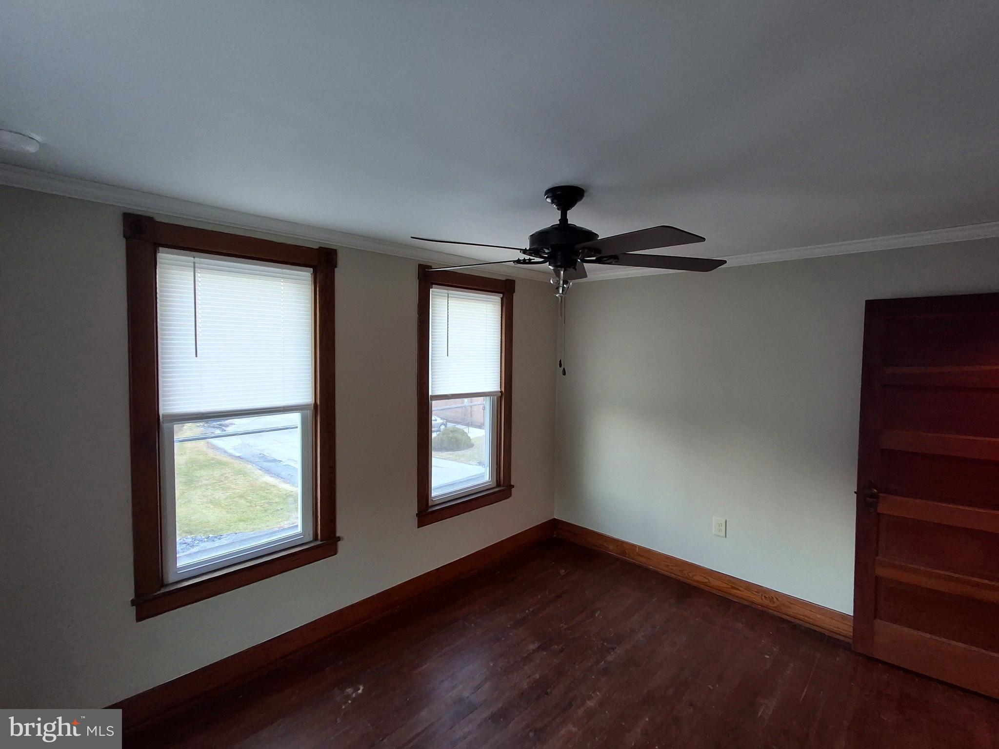 367 High Street Orrtanna, PA 17353 - Photo 18 of 26 a view of empty room with wooden floor and fan