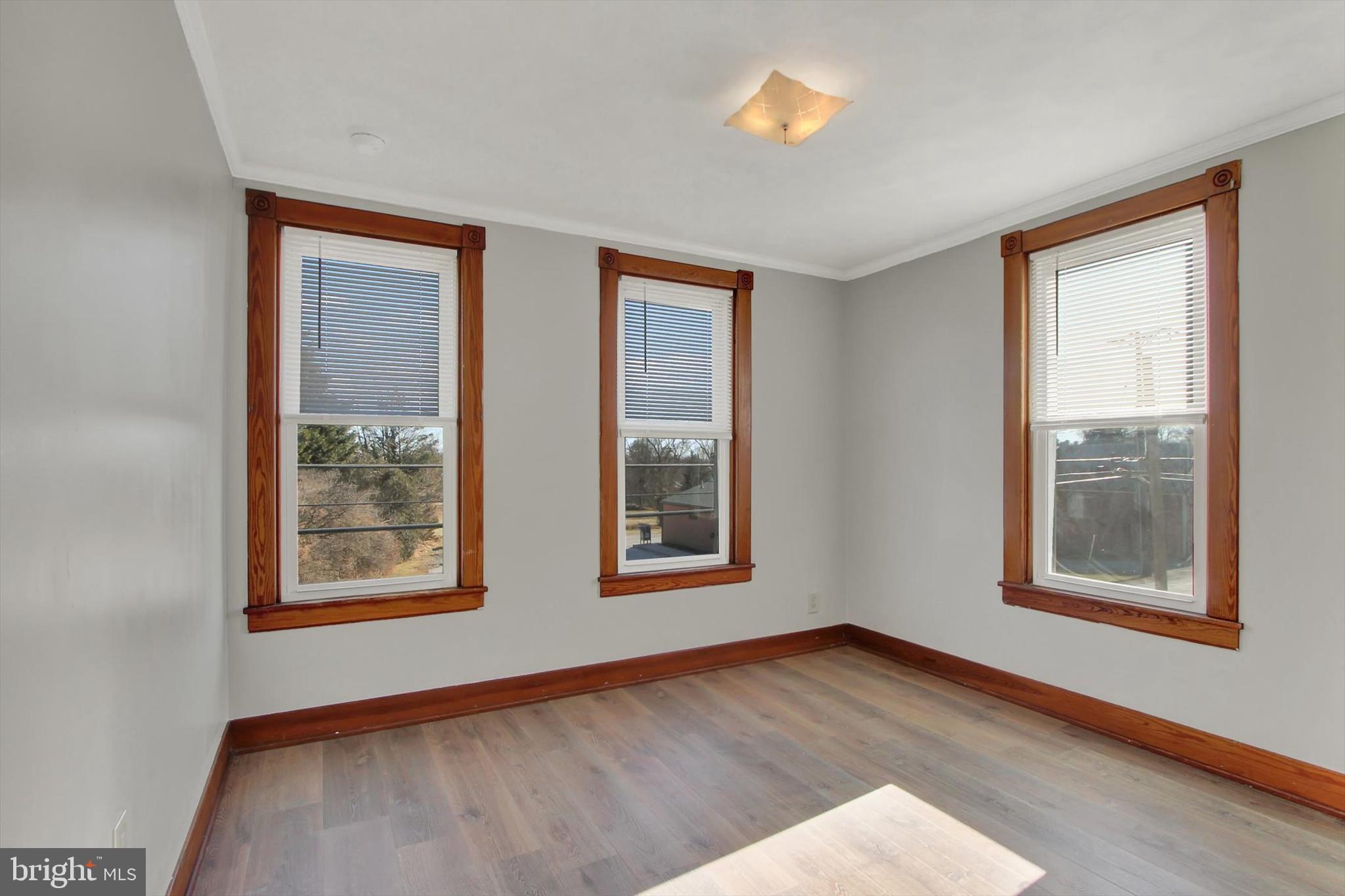 367 High Street Orrtanna, PA 17353 - Photo 22 of 26 an empty room with windows and closet
