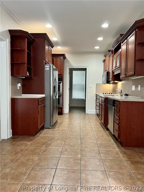 2633 Plum Ridge Road Fayetteville, NC 28306 - Photo 14 of 50 a large kitchen with stainless steel appliances granite countertop a refrigerator and a stove