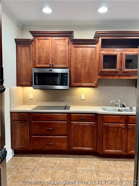 2633 Plum Ridge Road Fayetteville, NC 28306 - Photo 10 of 50 a kitchen with stainless steel appliances granite countertop a sink and a microwave