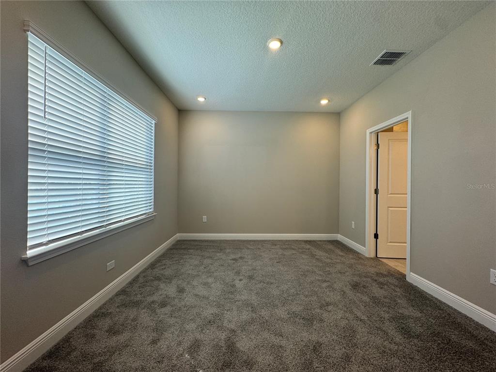 16333 Hamlin Hills Road Winter Garden, FL 34787 - Photo 28 of 35 an empty room with a window