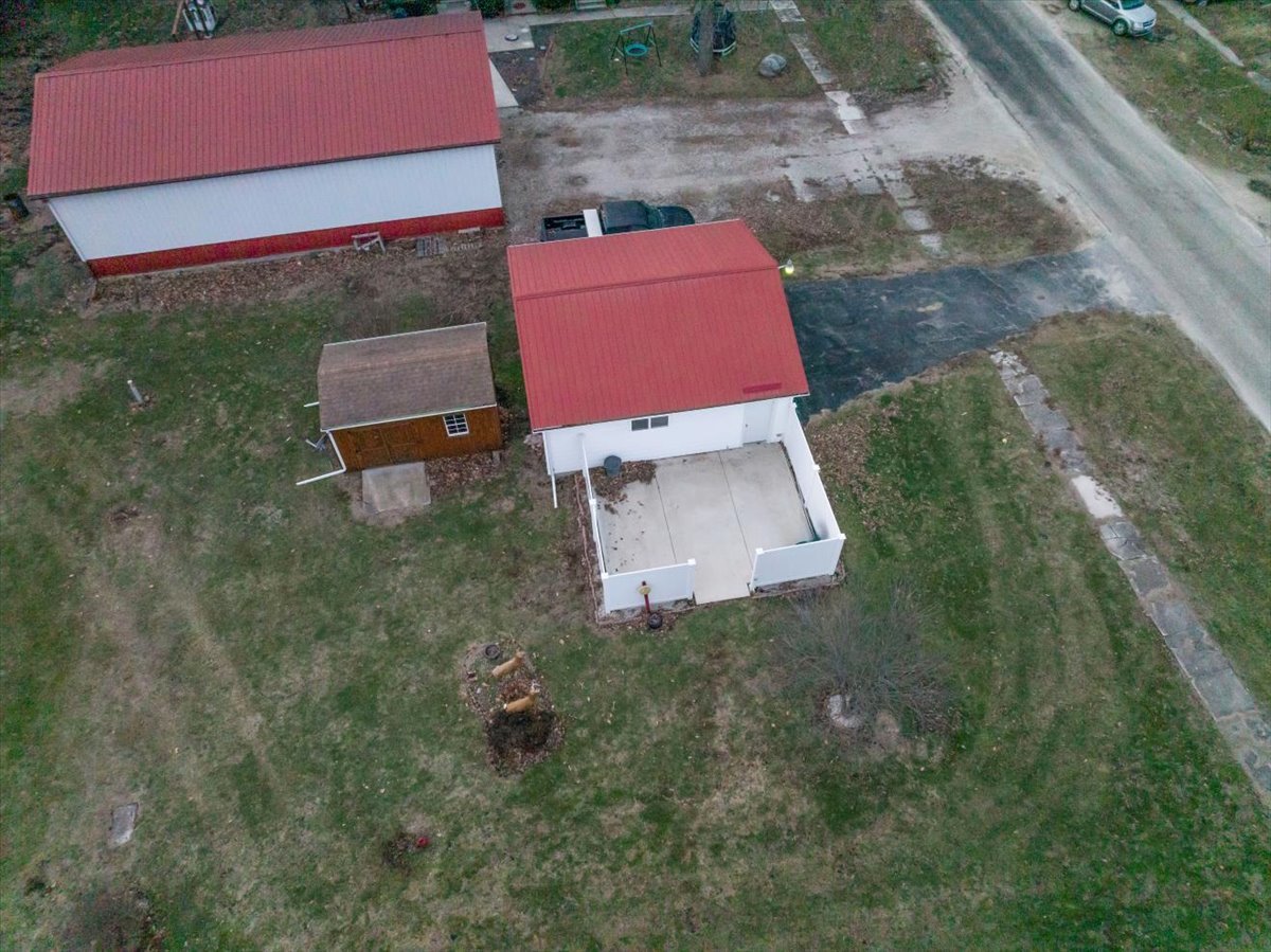 112 East Jefferson Street Dana, IL 61321 - Photo 6 of 40 an aerial view of a house with garden space and street view