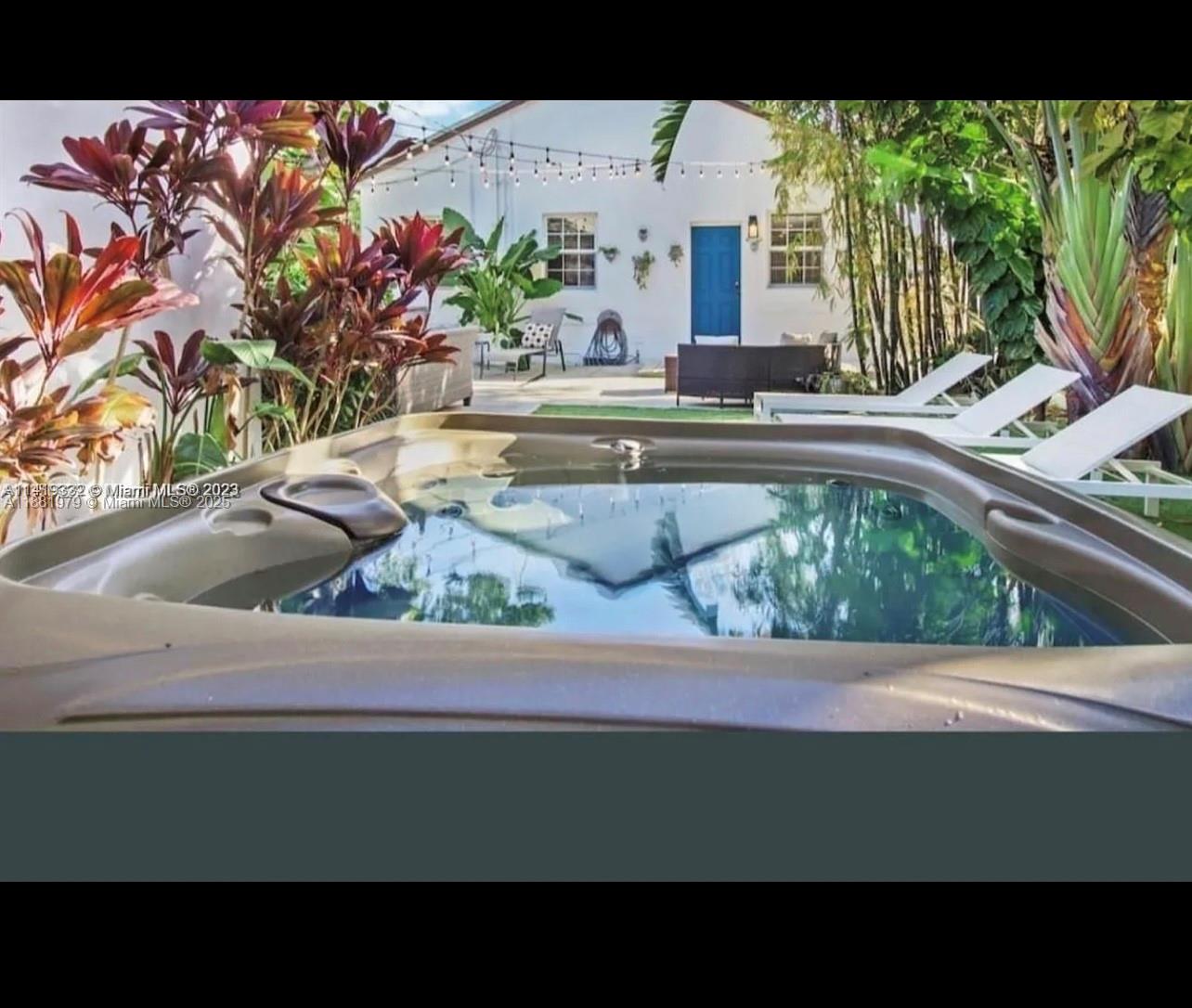 149 Northwest 48th Street Miami, FL 33127 - Photo 20 of 24 a kitchen sink with a stove