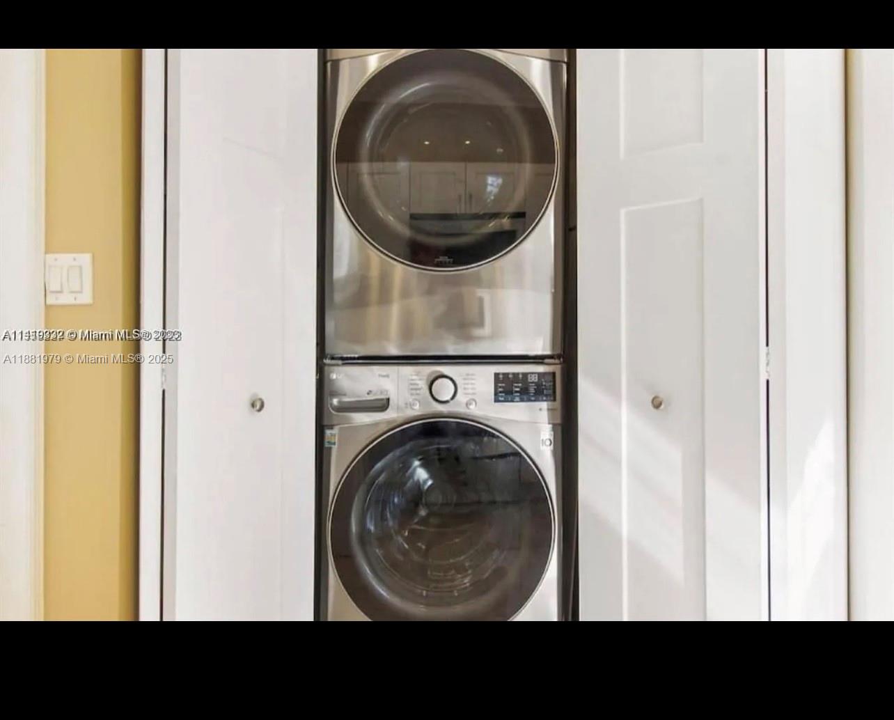 149 Northwest 48th Street Miami, FL 33127 - Photo 5 of 24 a view of a hallway with washer and dryer