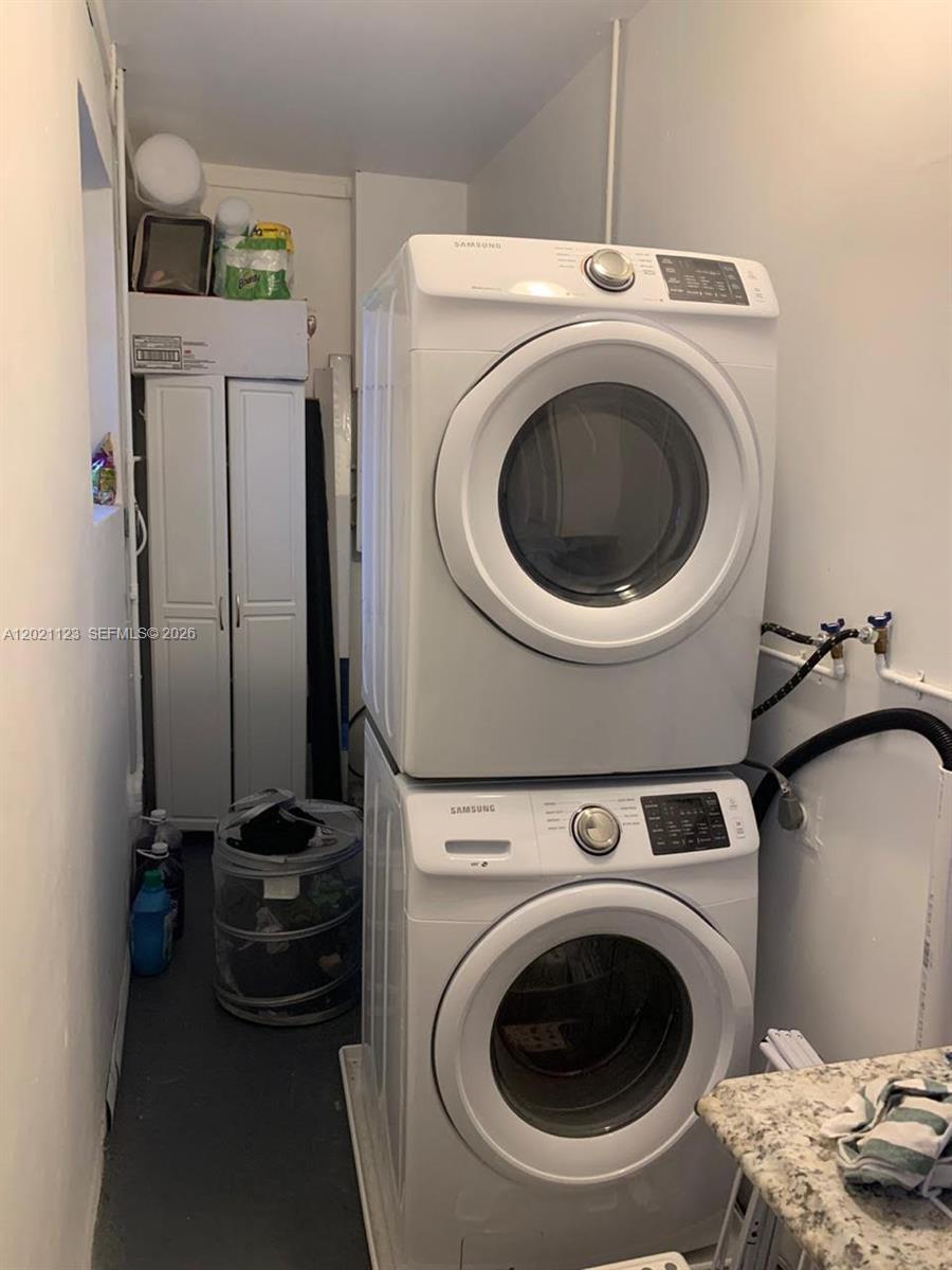 13220 Southwest 99th Place Miami, FL 33176 - Photo 12 of 16 a utility room with dryer and washer