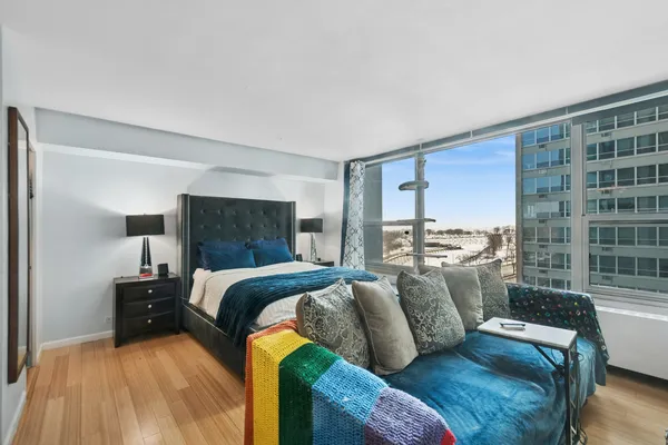 a bed room with a bed and a couch