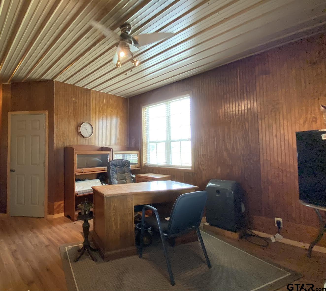 23120 Saddle Ridge Court Lindale, TX 75771 - Photo 32 of 34 a view of a workspace with furniture