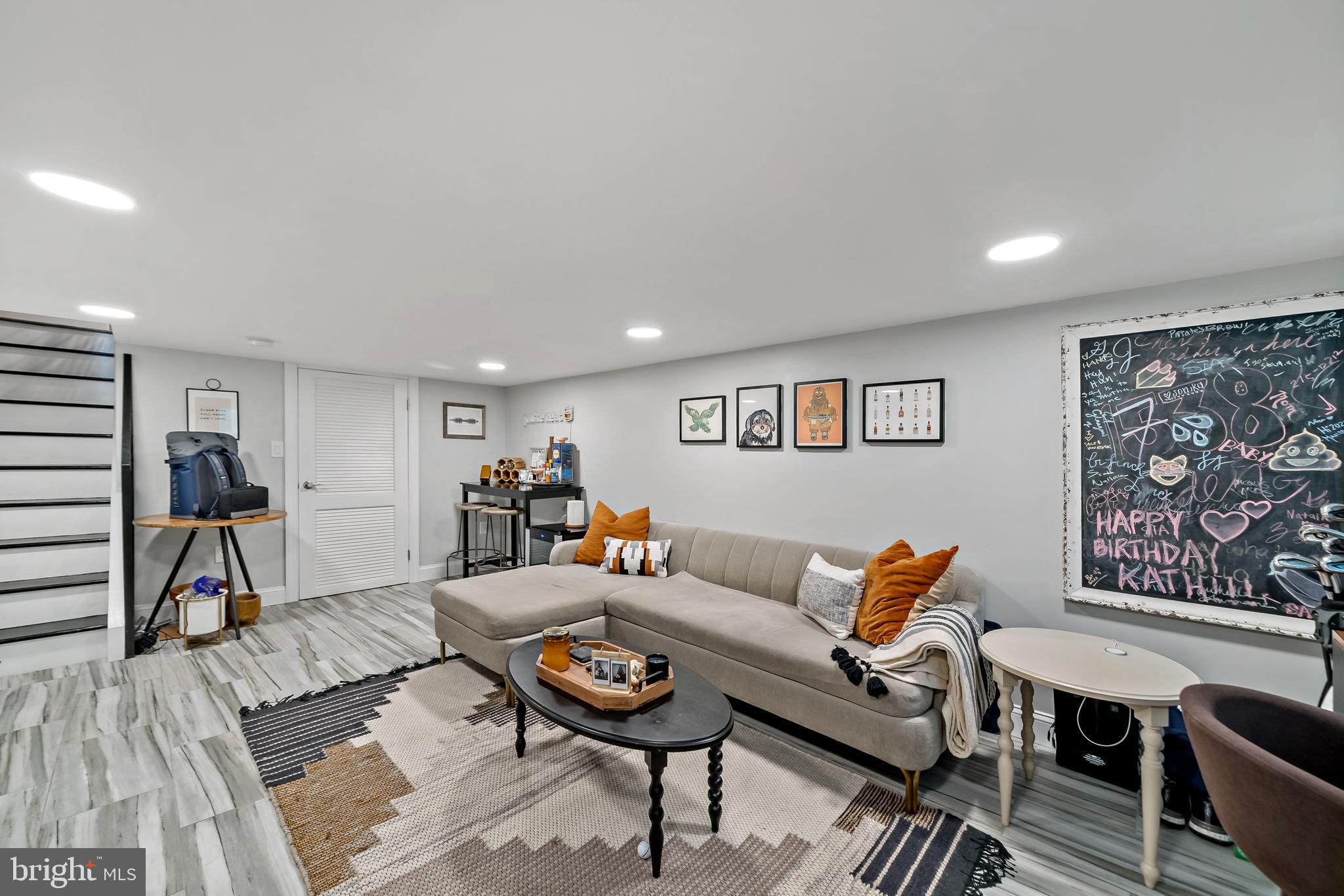 1225 Tree Street Philadelphia, PA 19148 - Photo 14 of 18 a living room with furniture a rug and a table