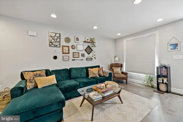 a living room with furniture and a couch