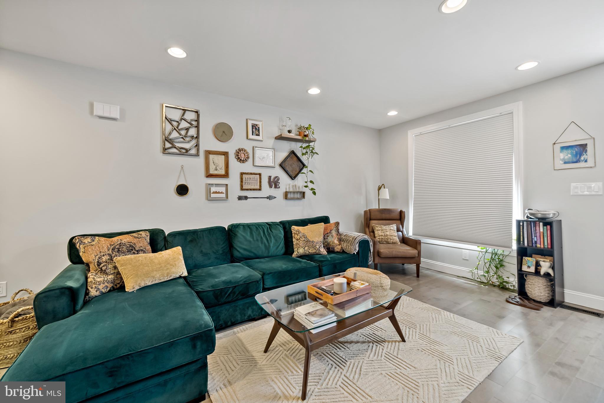 1225 Tree Street Philadelphia, PA 19148 - Photo 5 of 18 a living room with furniture and a couch