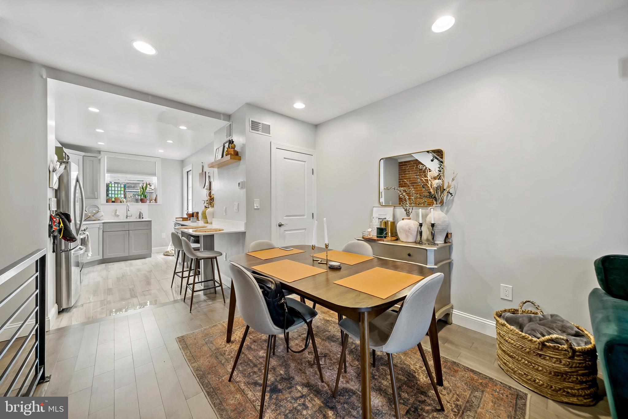 1225 Tree Street Philadelphia, PA 19148 - Photo 6 of 18 a dining room with furniture and wooden floor