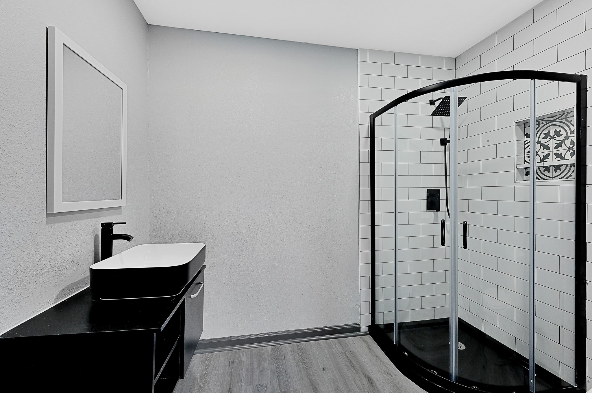 4406 Edison Street Houston, TX 77009 - Photo 17 of 42 a bathroom with a sink and a mirror