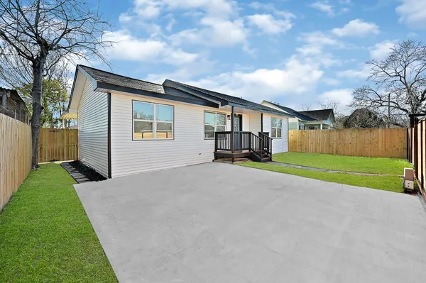a house view with a garden space