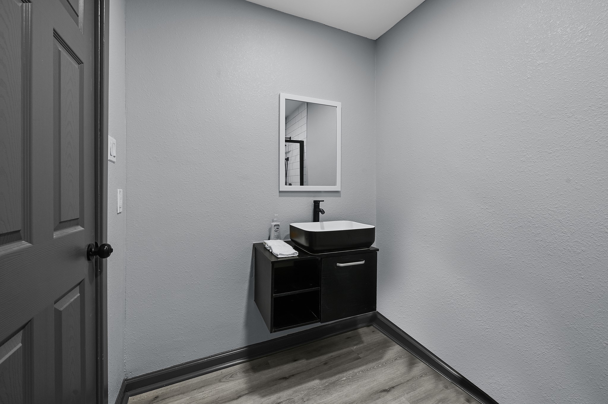 4406 Edison Street Houston, TX 77009 - Photo 32 of 42 a bathroom with a sink and a mirror