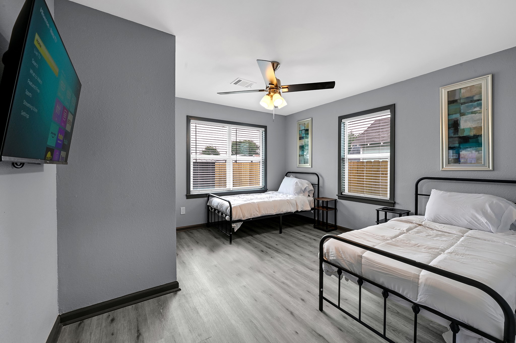 4406 Edison Street Houston, TX 77009 - Photo 33 of 42 a bedroom with a bed and a couch