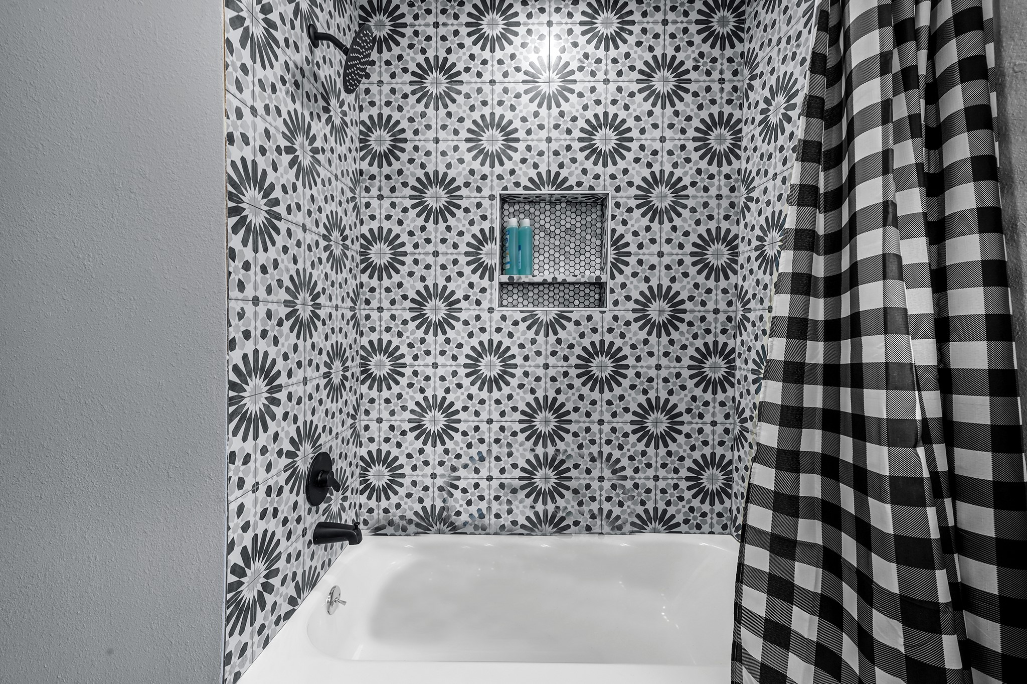 4406 Edison Street Houston, TX 77009 - Photo 36 of 42 a bathroom with a bathtub and a shower