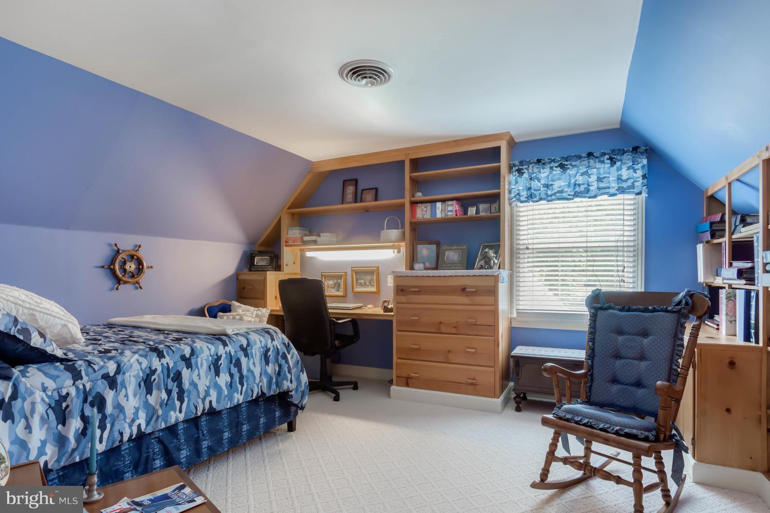 7301 Solitude Road St. Michaels, MD 21663 - Photo 29 of 30 a bedroom with a bed and furniture