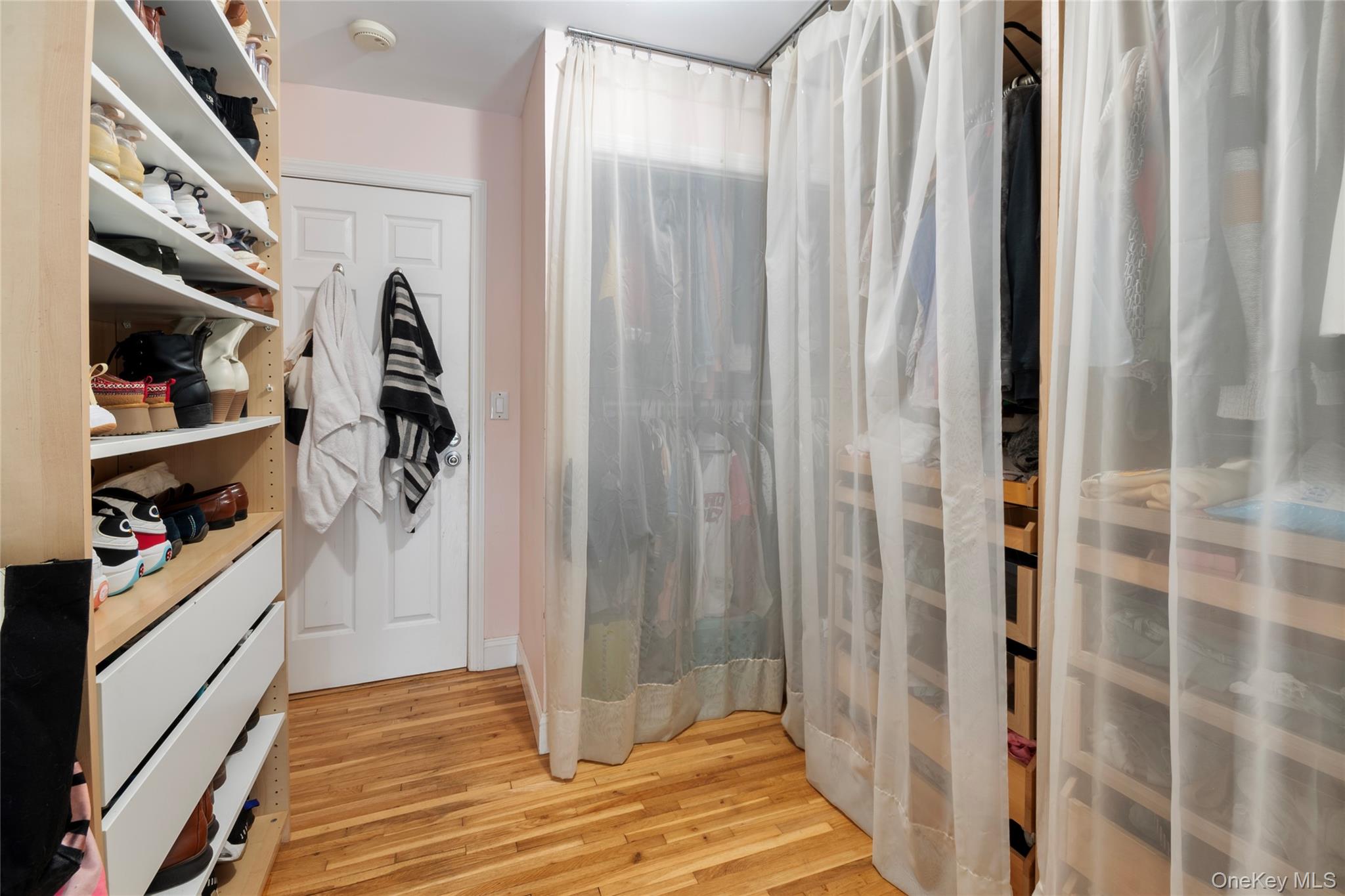 277 Horseblock Road Farmingville, NY 11738 - Photo 13 of 28 Spacious closet with light wood-type flooring