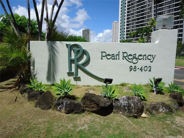 a view of a sign in front of building