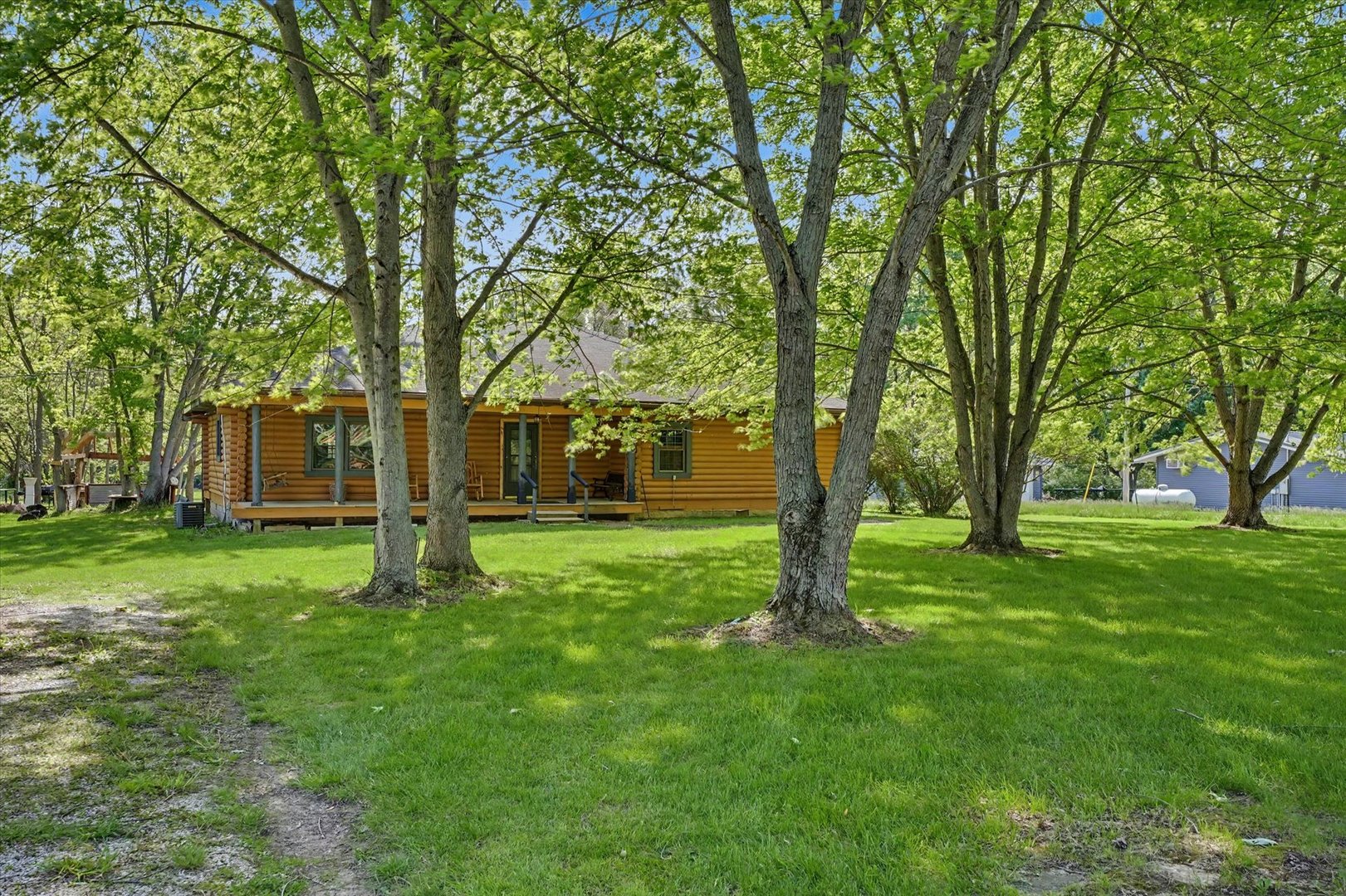 2431 North 1450 East Road Mansfield, IL 61854 - Photo 3 of 78 a view of a yard with a tree