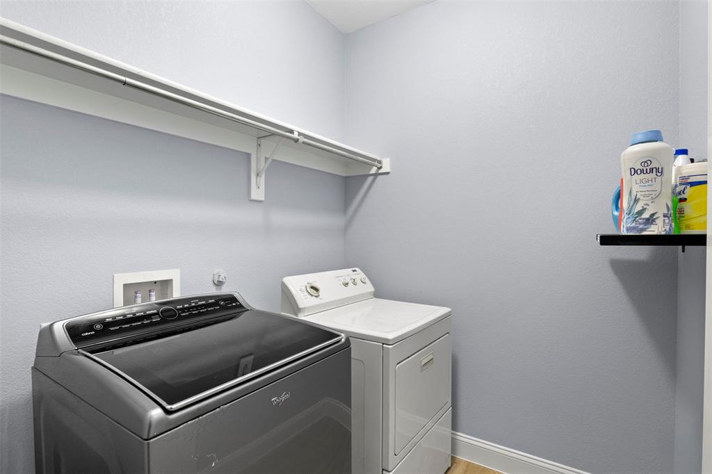 1318 Exeter Avenue Dallas, TX 75216 - Photo 18 of 31 a utility room with dryer and washer