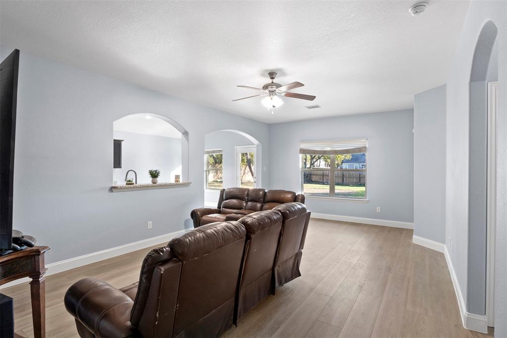 1318 Exeter Avenue Dallas, TX 75216 - Photo 20 of 31 a living room with furniture and a window