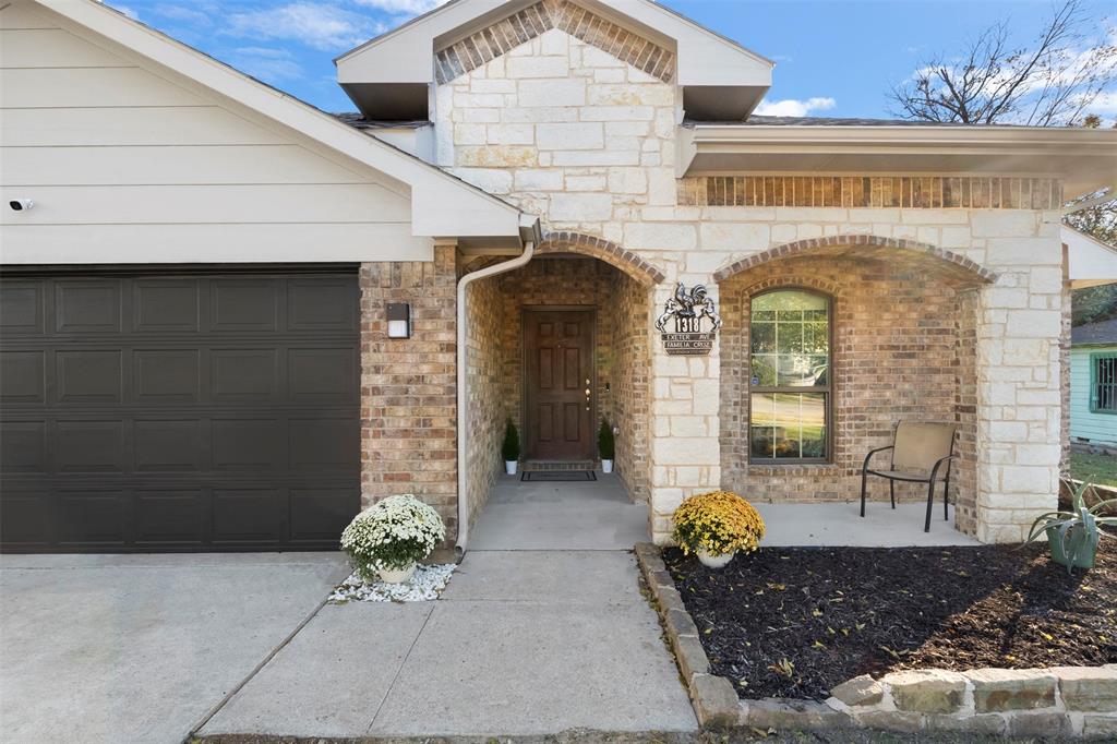 1318 Exeter Avenue Dallas, TX 75216 - Photo 2 of 31 a front view of a house with outdoor seating