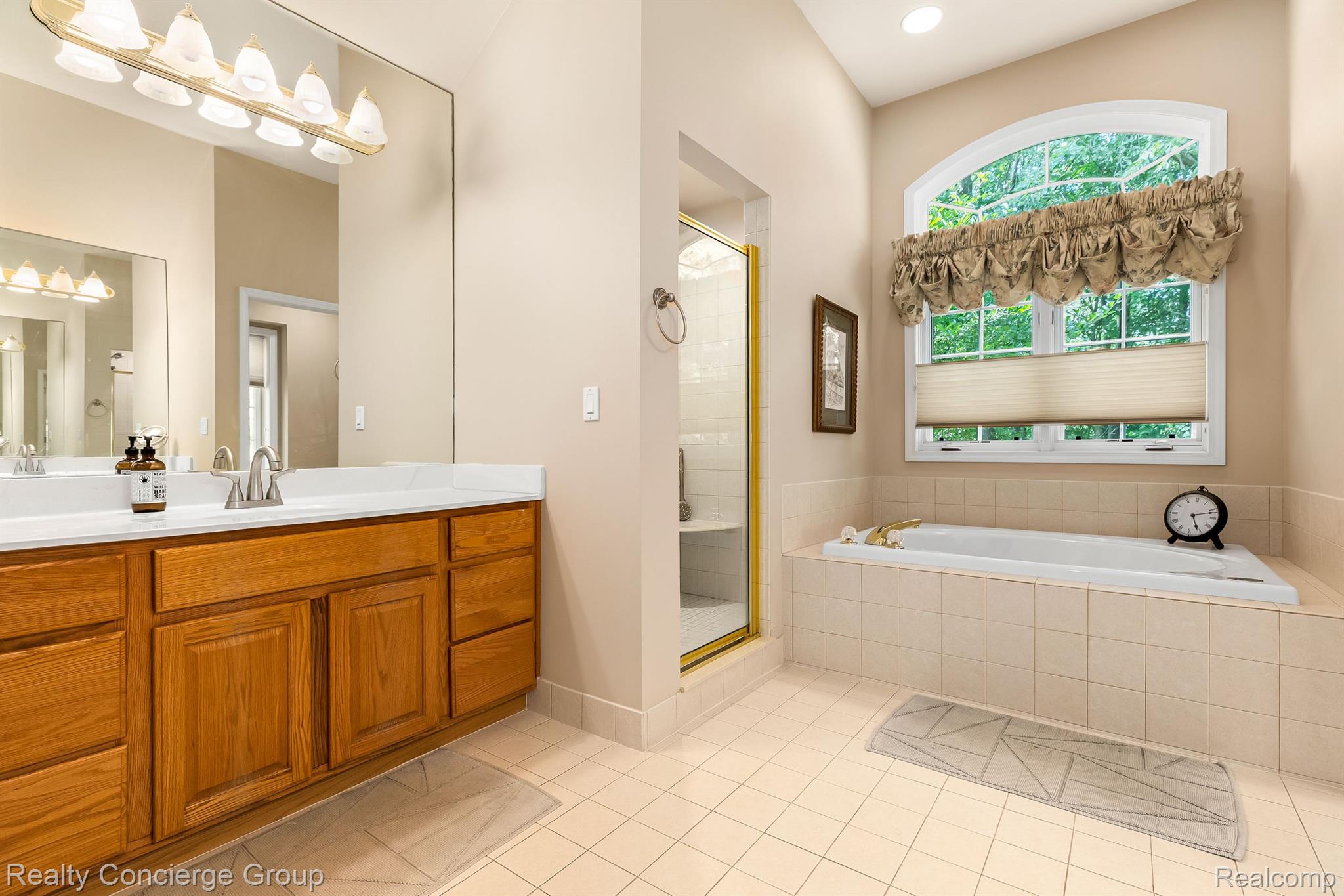 9761 Quail Ridge Run Brighton, MI 48114 - Photo 16 of 30 Master bath features jetted tub & walk-in shower