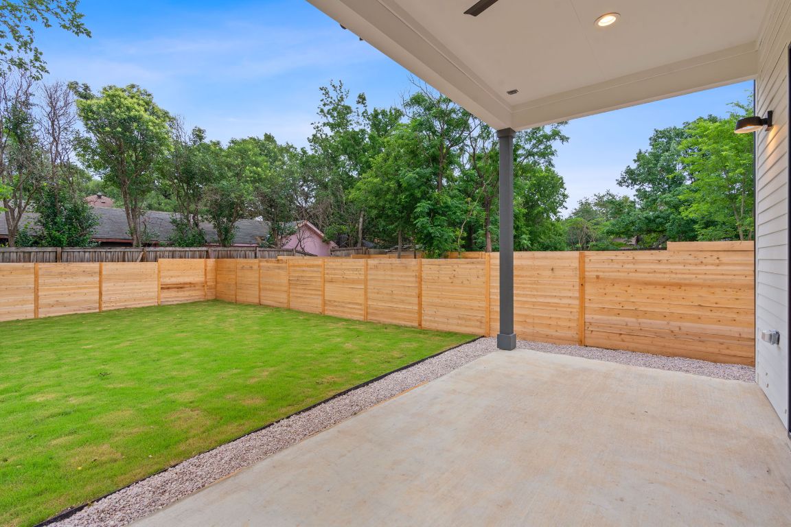 3412 Blumie Street, Unit 1 Austin, TX 78745 - Photo 28 of 39 Fenced backyard with a patio