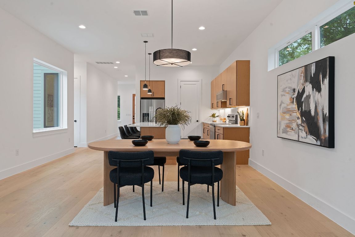 3412 Blumie Street, Unit 1 Austin, TX 78745 - Photo 6 of 39 Dining area featuring recessed lighting and light wood-style flooring
