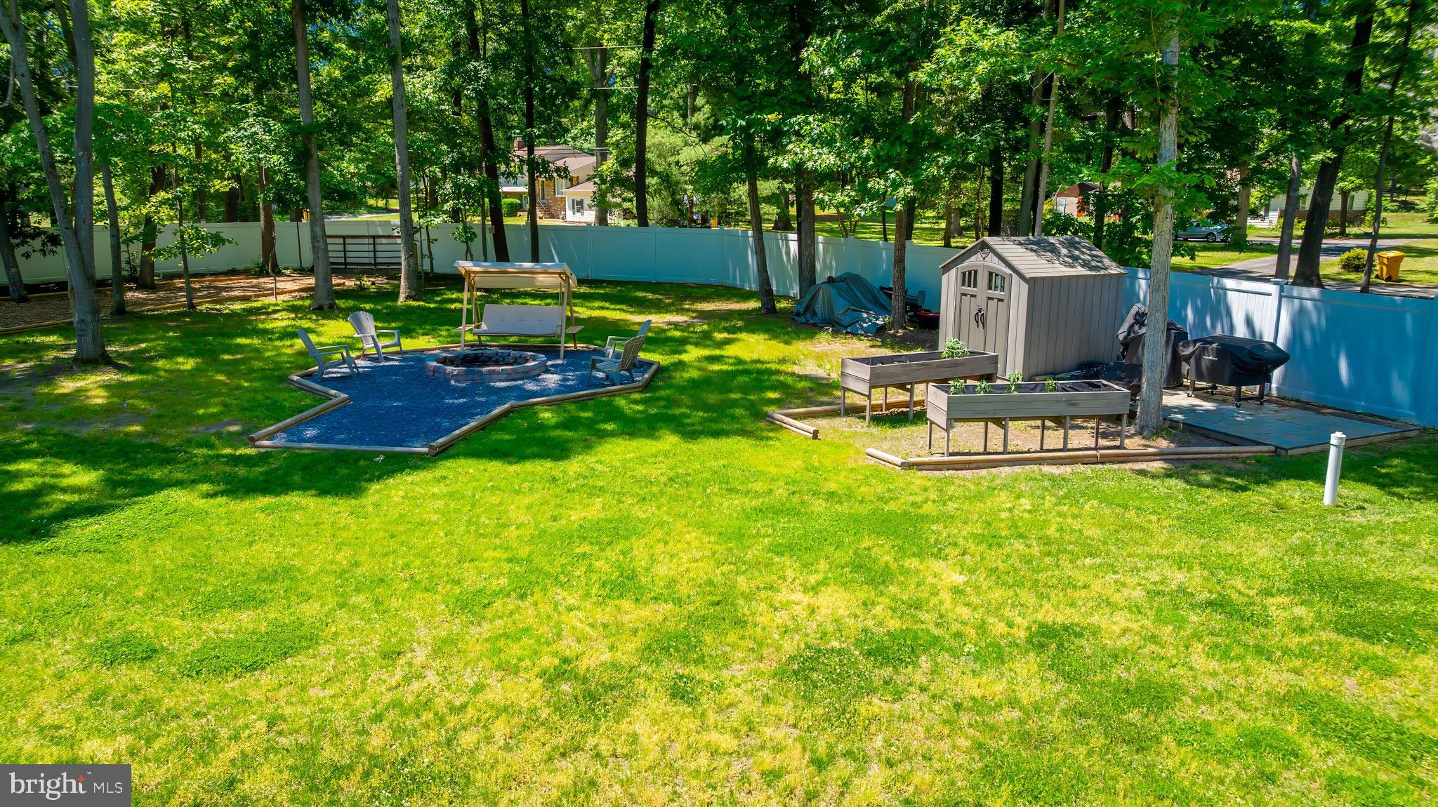 8331 Woodland Road Pasadena, MD 21122 - Photo 6 of 63 Raised Garden Beds and Fire Pit