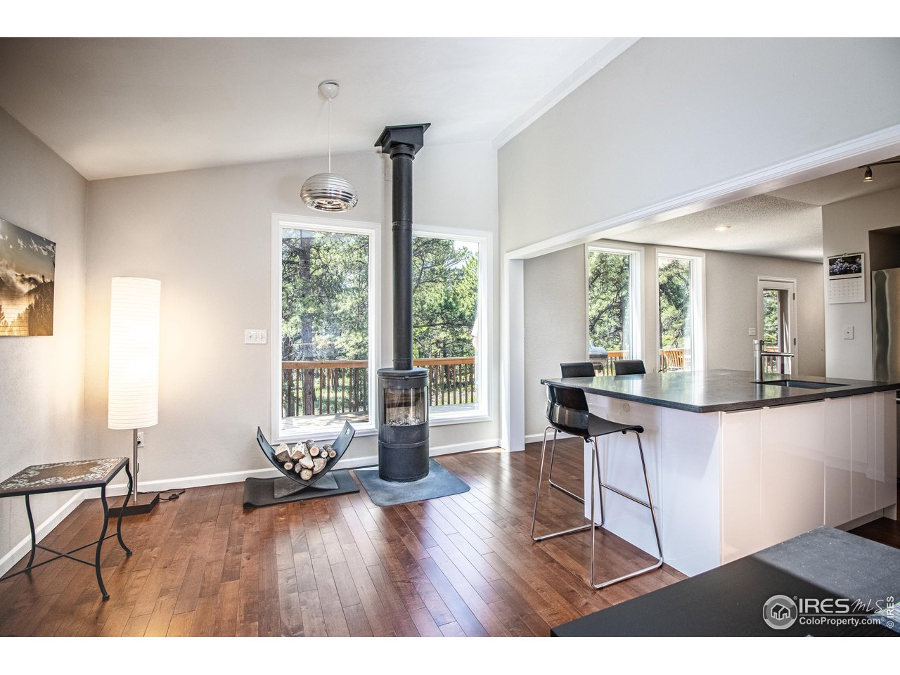 418 Ridge Road Ward, CO 80481 - Photo 11 of 36 a living room with furniture and a large window