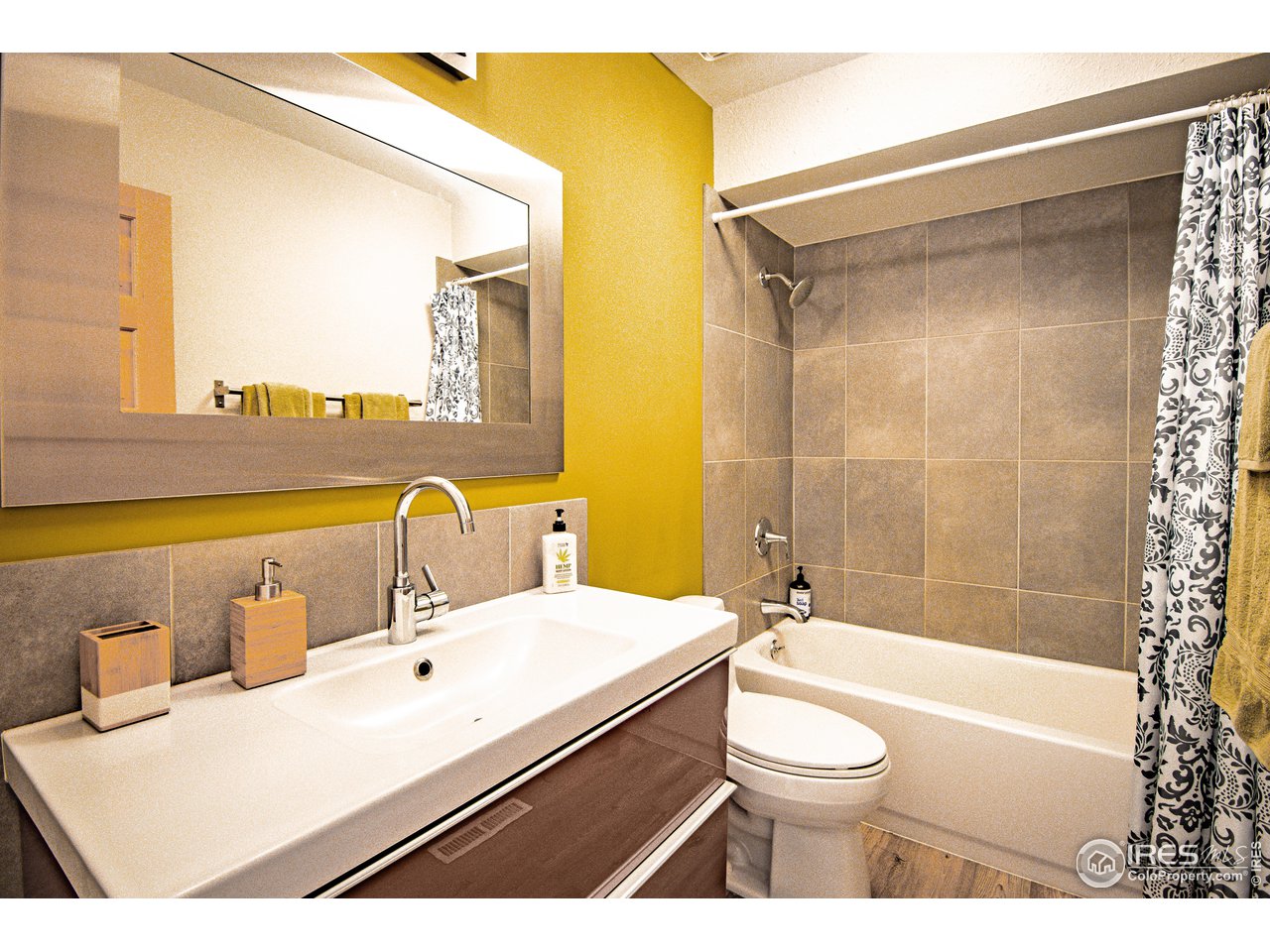 418 Ridge Road Ward, CO 80481 - Photo 24 of 36 a bathroom with a sink a toilet and shower