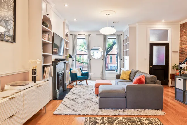 a view of building with outdoor space and sitting area