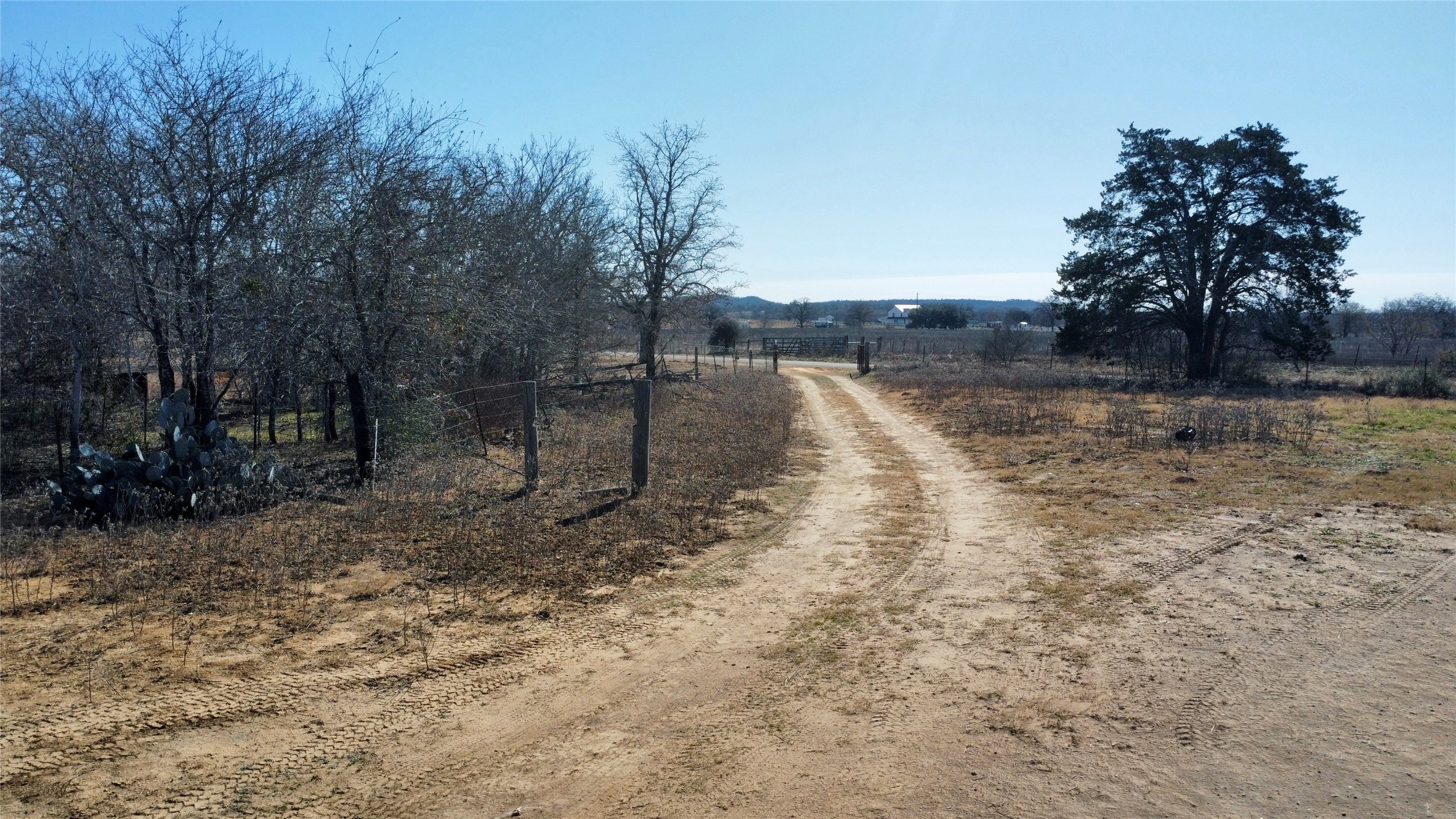 5633 Tenney Creek Road Luling, TX 78648 - Photo 1 of 1 View of dirt / gravel road with a view of rural / pastoral area