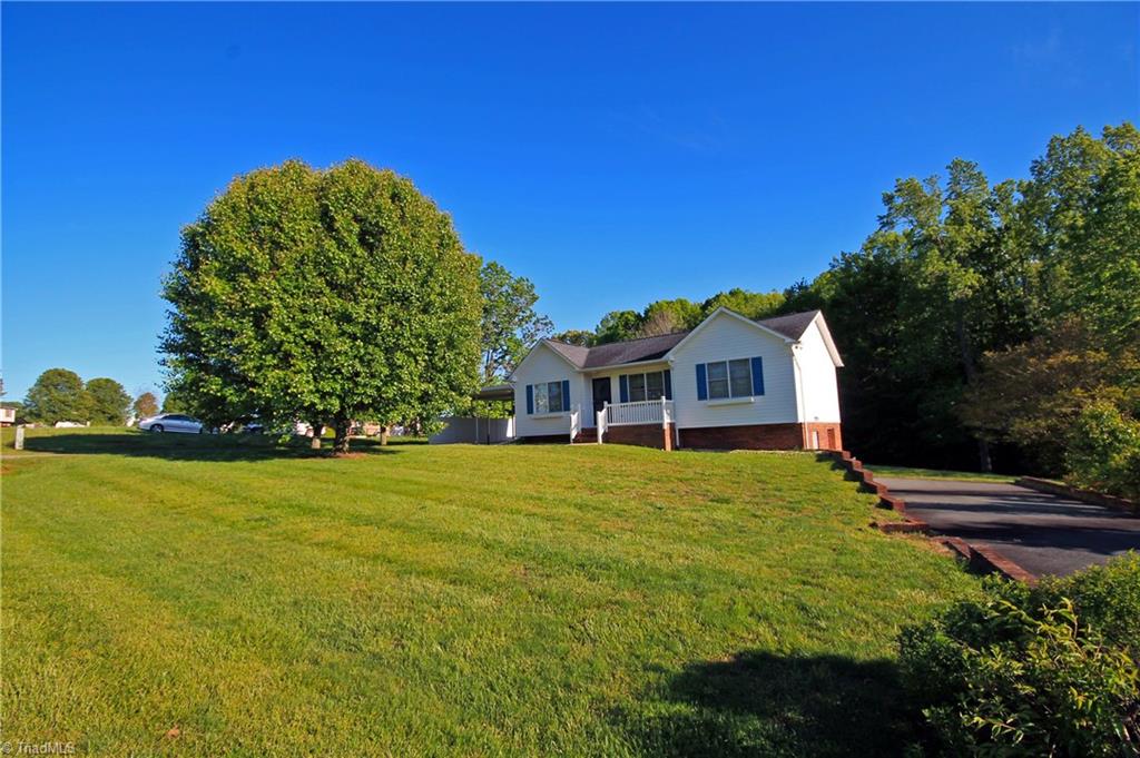 1155 Capella Ridge Road King, NC 27021 - Photo 1 of 21 Front of house and yard