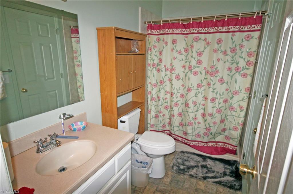 1155 Capella Ridge Road King, NC 27021 - Photo 14 of 21 Full bathroom with door to half bath/Master bedroom