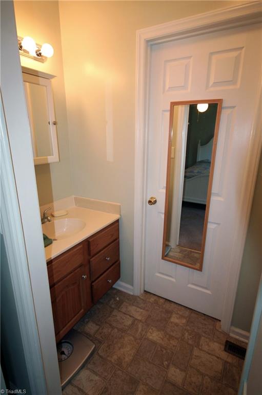 1155 Capella Ridge Road King, NC 27021 - Photo 19 of 21 Half bath in Master bedroom with access to full bath