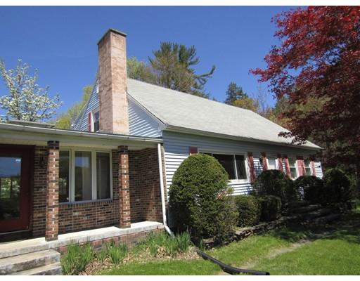 52 Stage Road Westhampton, MA 01027 - Photo 1 of 20 a front view of a house with garden
