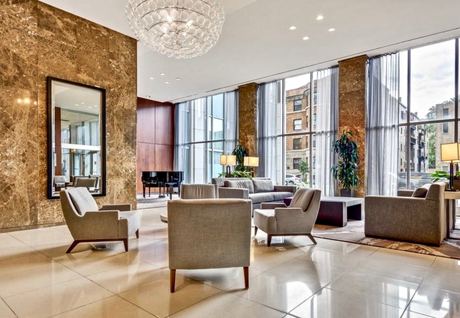 655 West Irving Park Road, Unit 2509 Chicago, IL 60613 - Photo 12 of 20 a living room with furniture and large windows