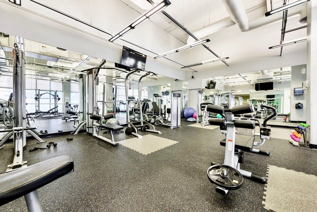 655 West Irving Park Road, Unit 2509 Chicago, IL 60613 - Photo 16 of 20 a view of a room with gym equipment