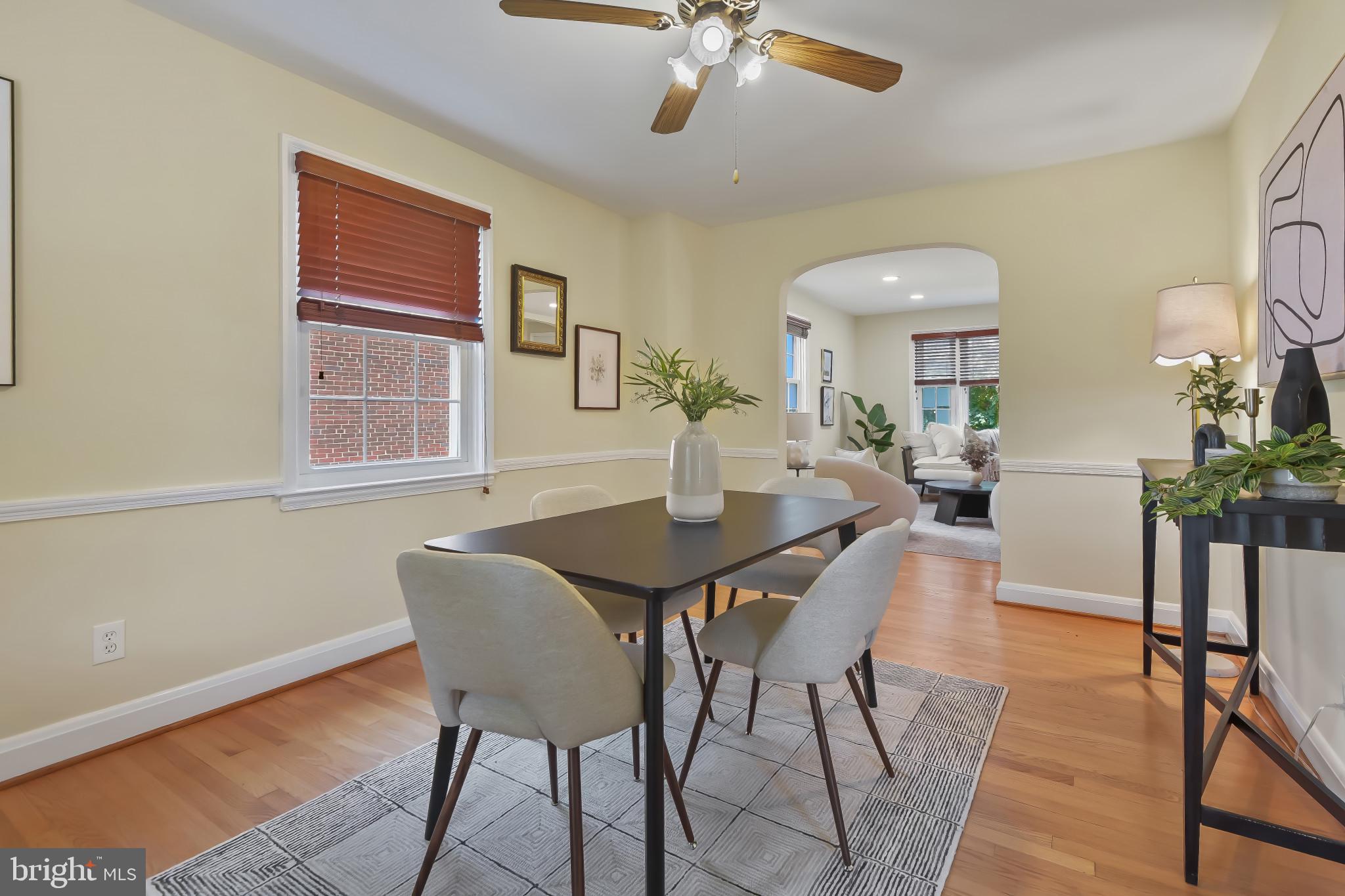 101 Regester Avenue Baltimore, MD 21212 - Photo 11 of 53 a view of a dining room with furniture and wooden floor