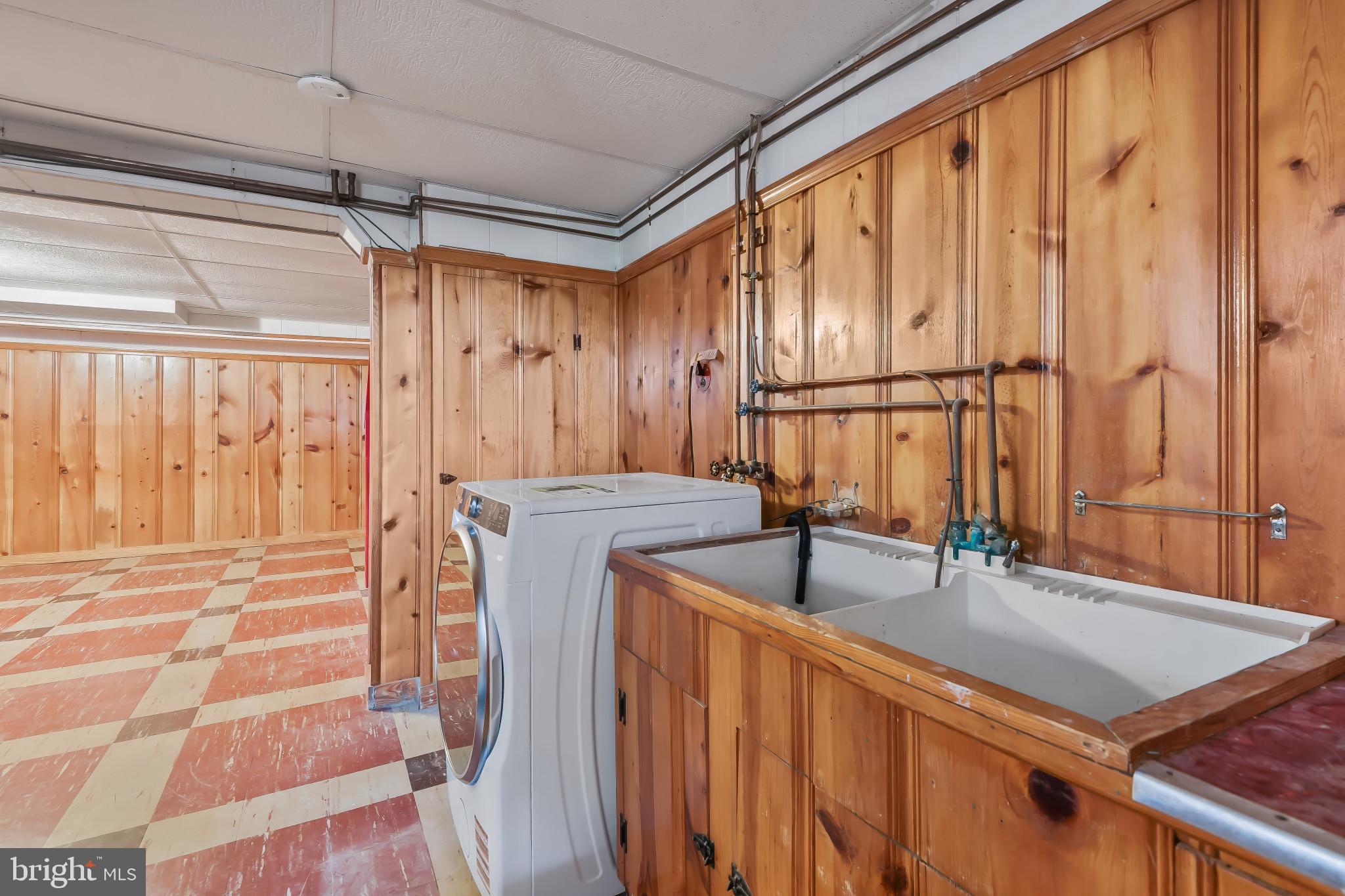 101 Regester Avenue Baltimore, MD 21212 - Photo 18 of 53 a kitchen with stainless steel appliances granite countertop a sink and a refrigerator