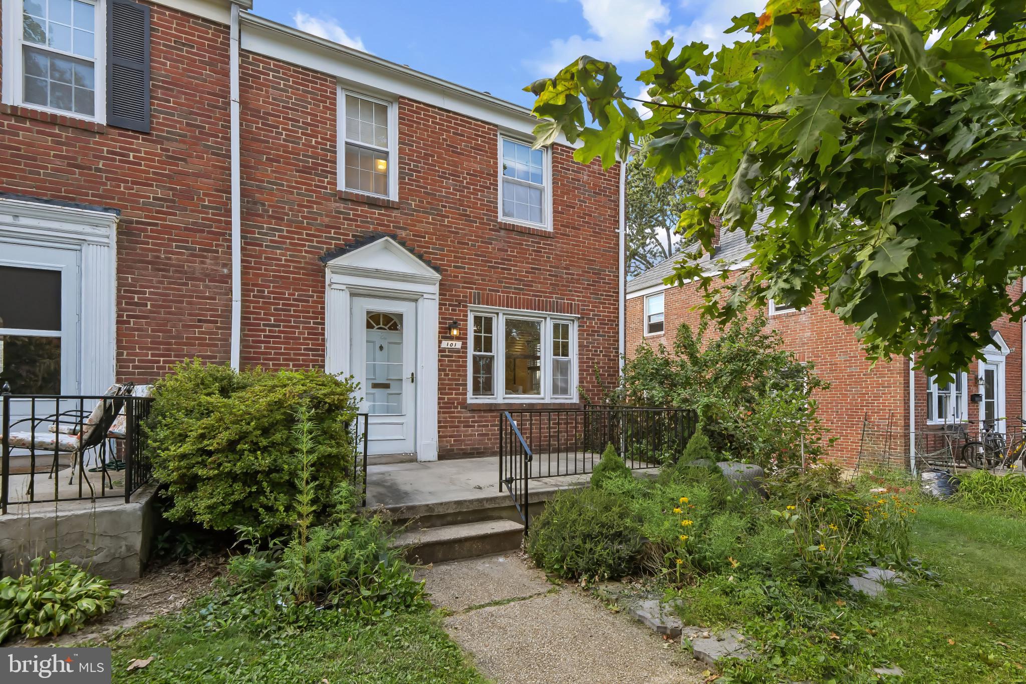 101 Regester Avenue Baltimore, MD 21212 - Photo 2 of 53 a front view of a house with garden