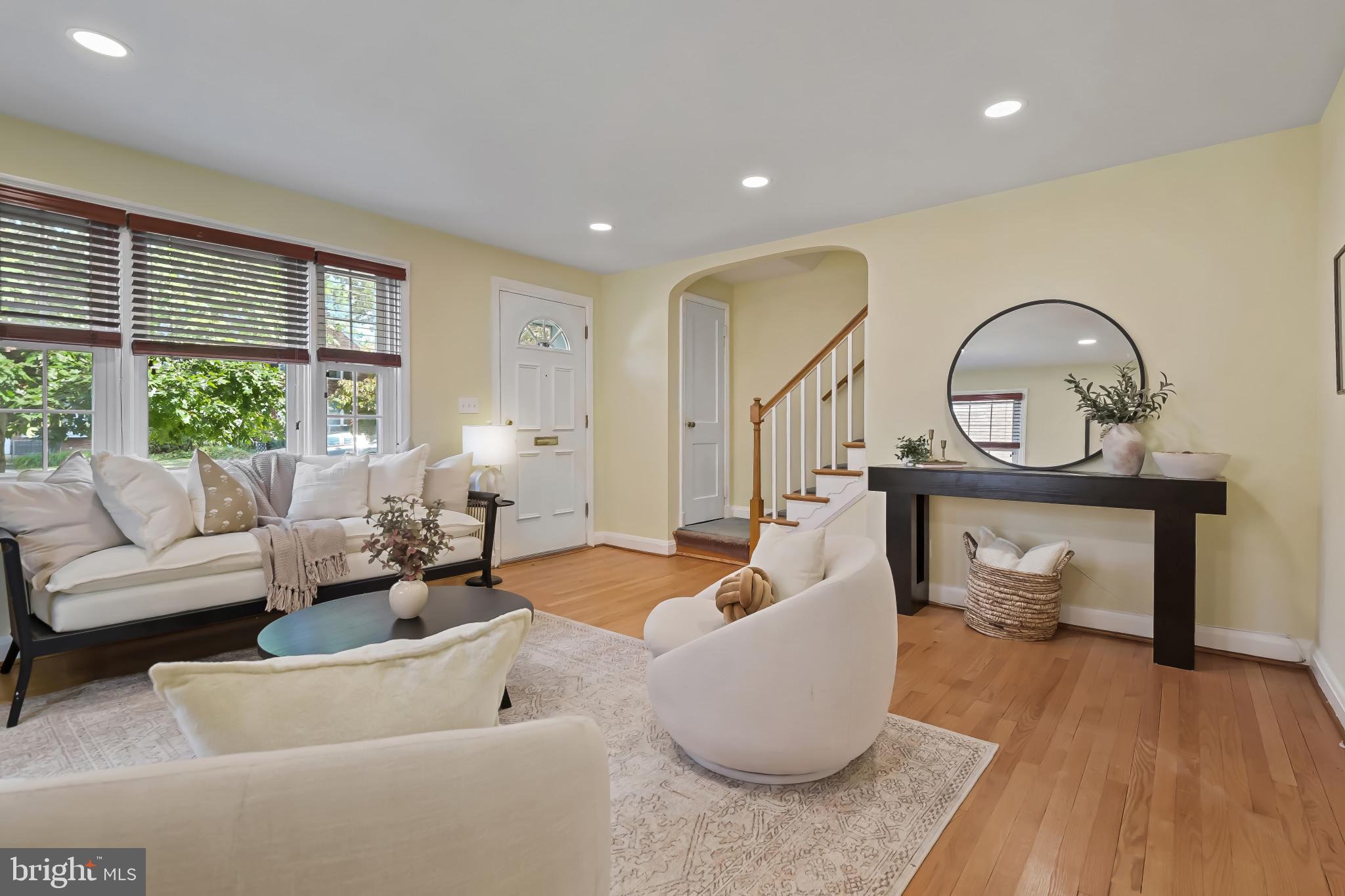 101 Regester Avenue Baltimore, MD 21212 - Photo 24 of 53 a living room with furniture a fireplace and a window
