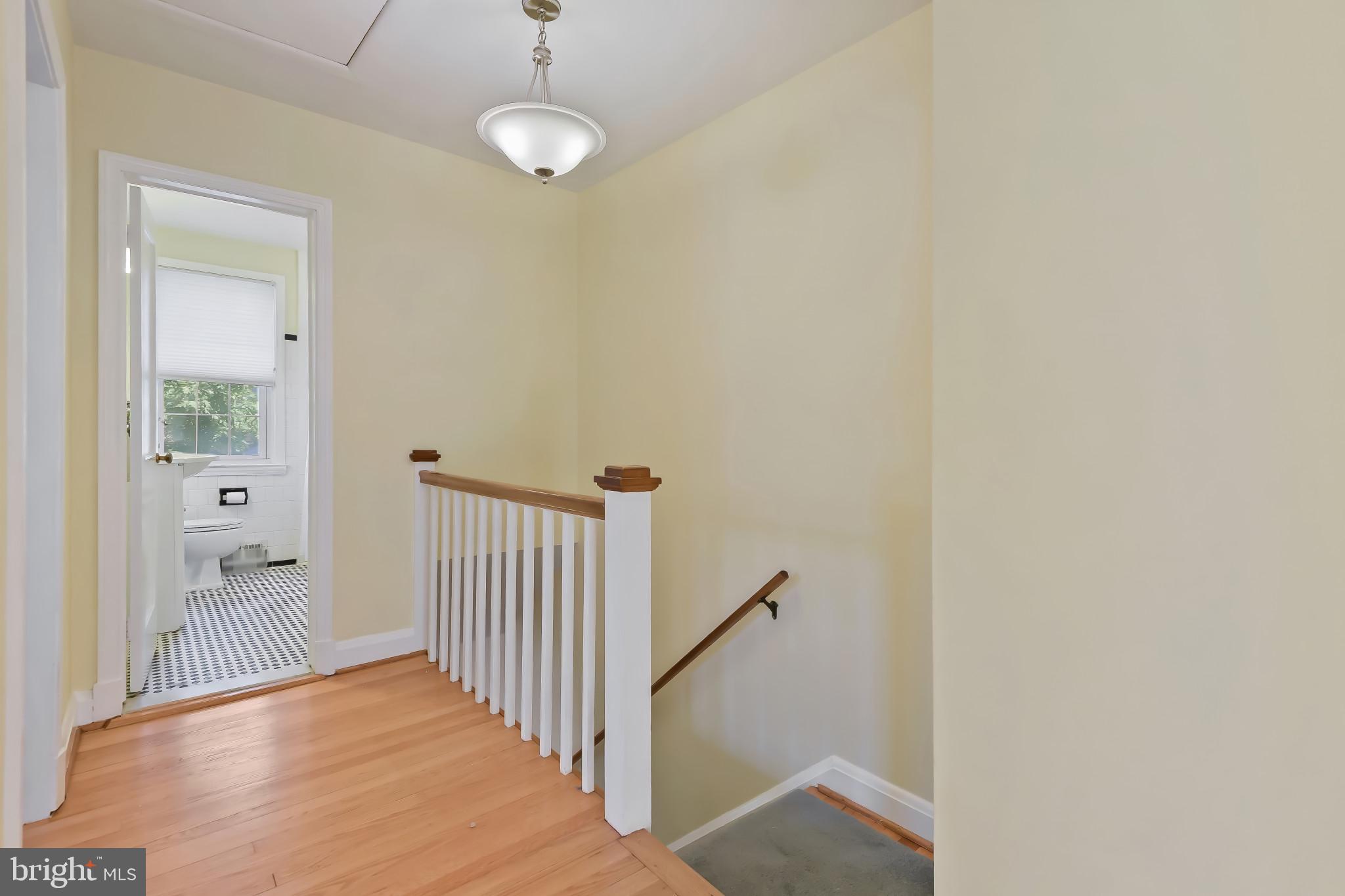 101 Regester Avenue Baltimore, MD 21212 - Photo 25 of 53 a view of a hallway with wooden floor and entryway