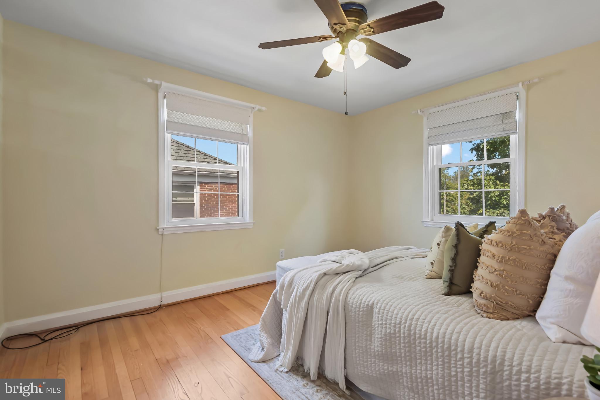 101 Regester Avenue Baltimore, MD 21212 - Photo 30 of 53 a bedroom with a large bed and a window